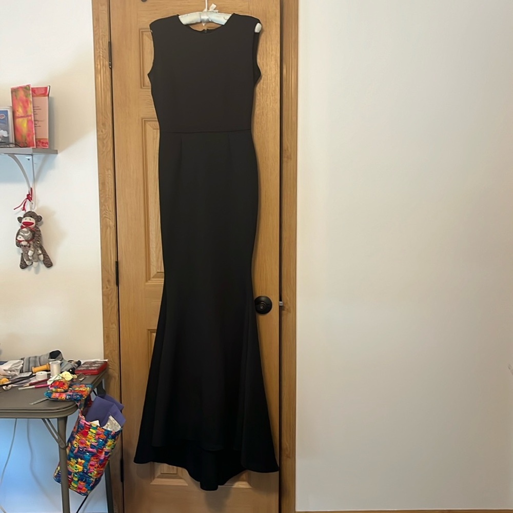 Black medium formal sleeveless mermaid dress. Elegant and timeless.